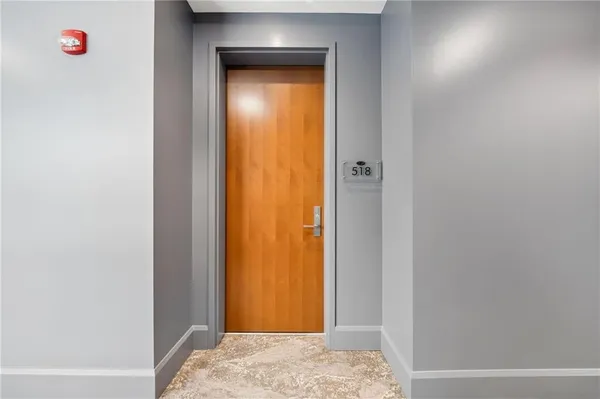 a view of a bedroom from a hallway