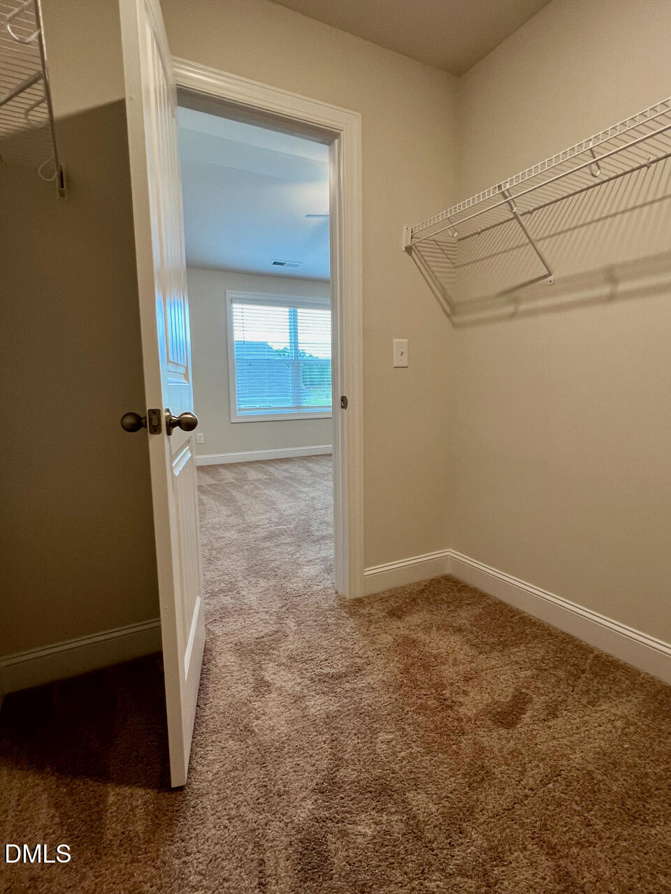 6905 Outfall Point Lane Raleigh, NC 27616 - Photo 17 of 44 an empty room with a bench
