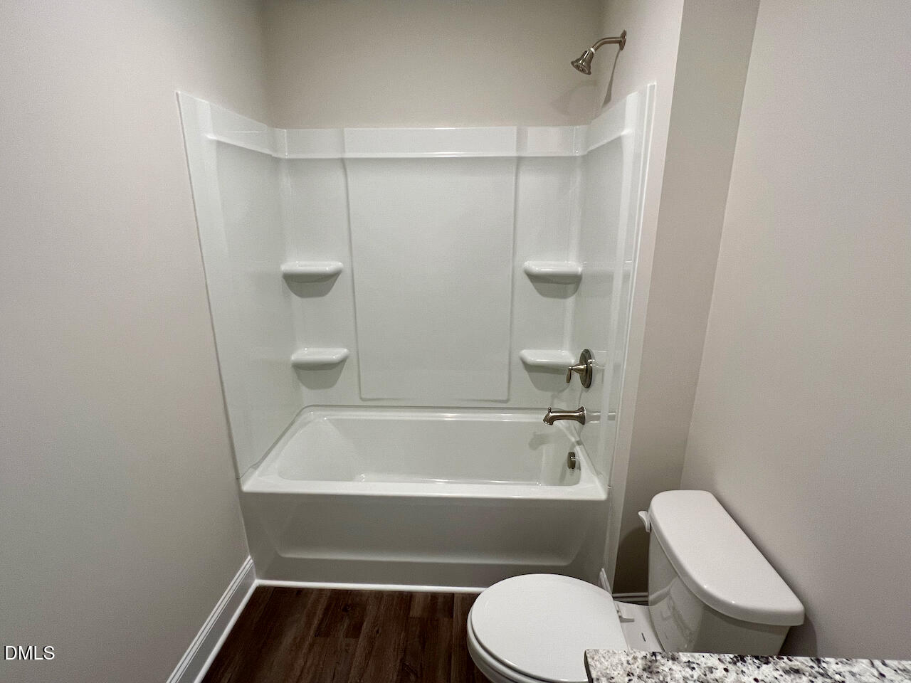 6905 Outfall Point Lane Raleigh, NC 27616 - Photo 31 of 44 a bathroom with a toilet and a bathtub