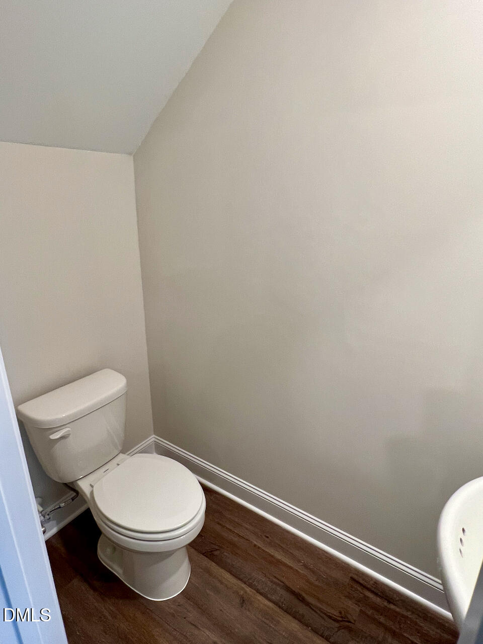 6905 Outfall Point Lane Raleigh, NC 27616 - Photo 6 of 44 a white toilet sitting next to a shower