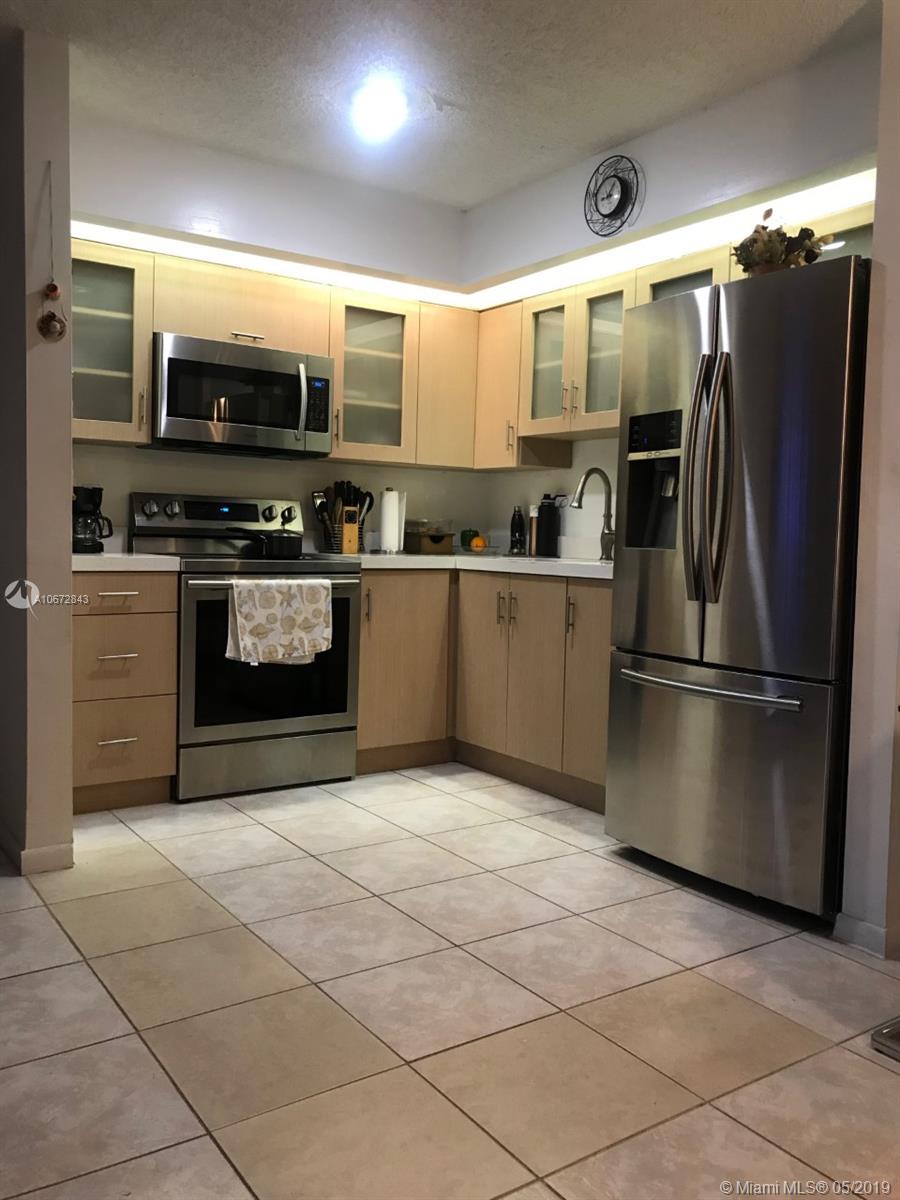 9489 West McNab Road, Unit 106 Tamarac, FL 33321 - Photo 1 of 19 Gallery Image 1