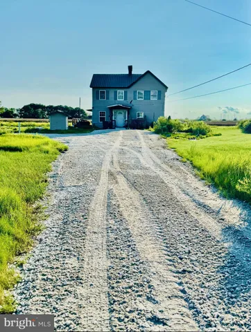a view of a house with a swimming pool