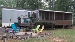 136 Redbud Lane Saluda, SC 29138 - Photo 13 of 17 a view of a chair and table in backyard