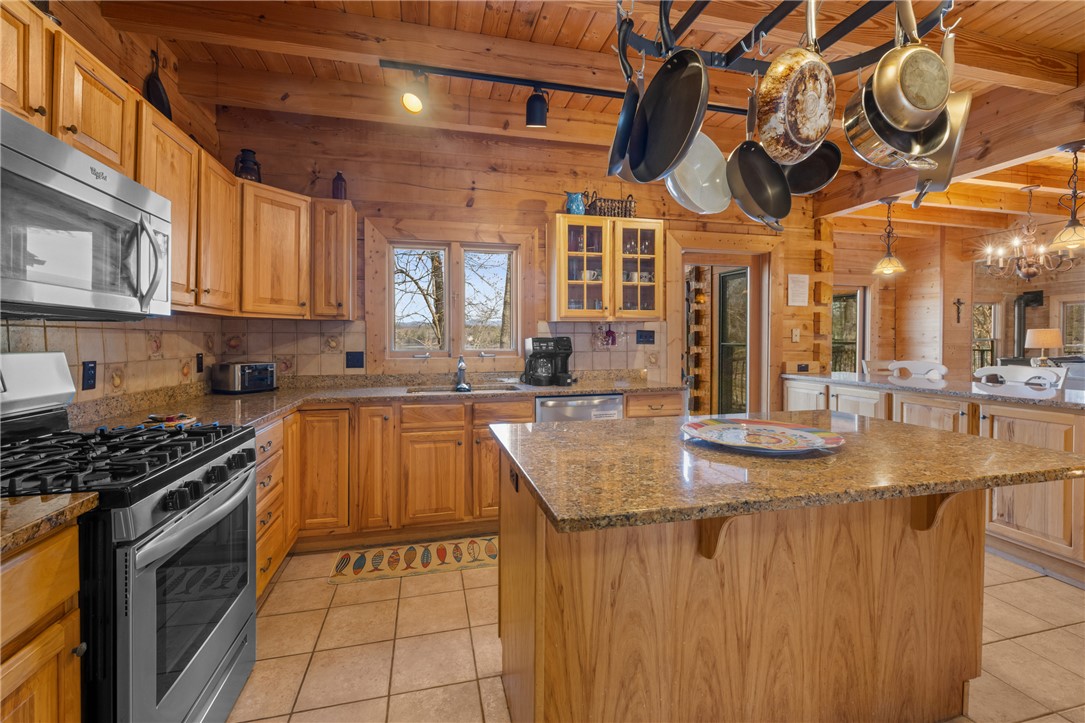 109 Deer Laurel Way Salem, SC 29676 - Photo 17 of 50 This spacious kitchen offers ample countertop space and a functional island, perfect for culinary endeavors.