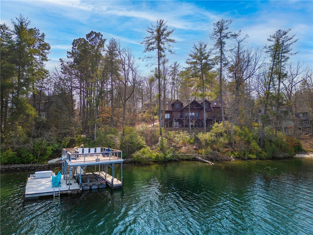109 Deer Laurel Way Salem, SC 29676 - Photo 2 of 50 This charming lakeside home features a private dock, offering direct access to tranquil waters.