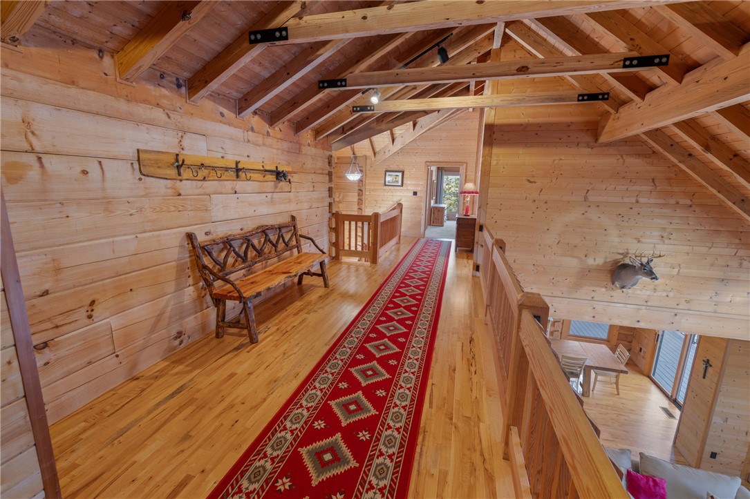 109 Deer Laurel Way Salem, SC 29676 - Photo 23 of 50 This captivating interior features warm wood accents and an inviting overlook into the living area.