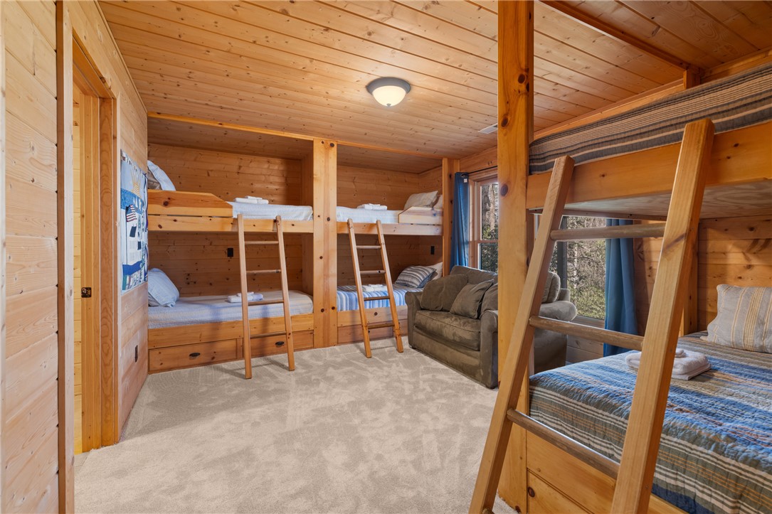 109 Deer Laurel Way Salem, SC 29676 - Photo 31 of 50 This cozy bedroom features multiple built-in bunk beds, perfect for accommodating many guests.