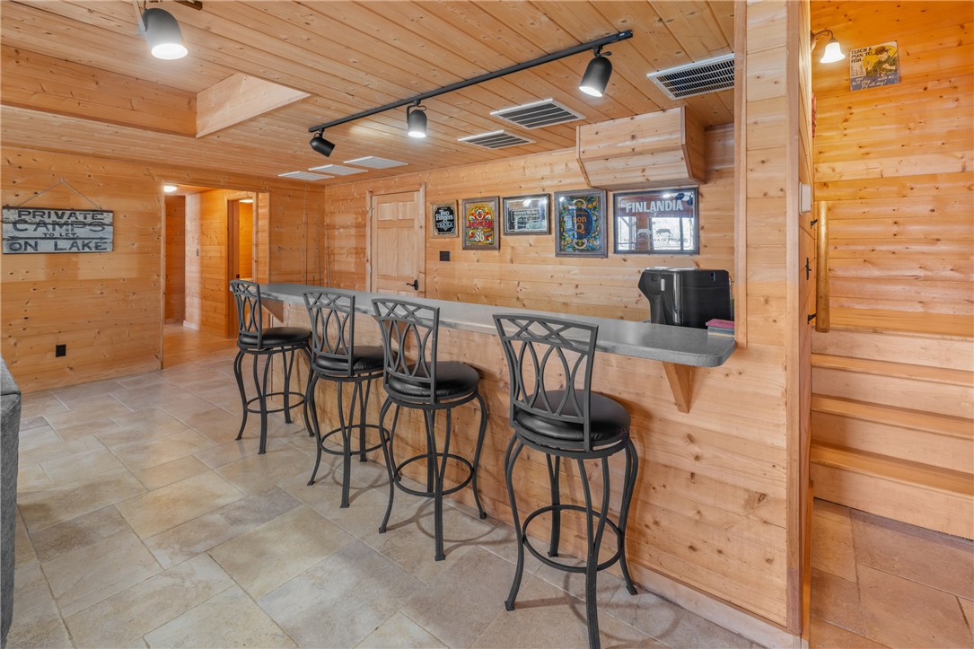 109 Deer Laurel Way Salem, SC 29676 - Photo 35 of 50 This rustic entertainment space features a full bar, perfect for gatherings.
