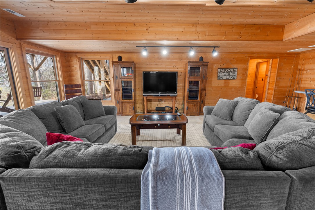 109 Deer Laurel Way Salem, SC 29676 - Photo 36 of 50 This living room provides a warm and inviting atmosphere, perfect for relaxation and gatherings.