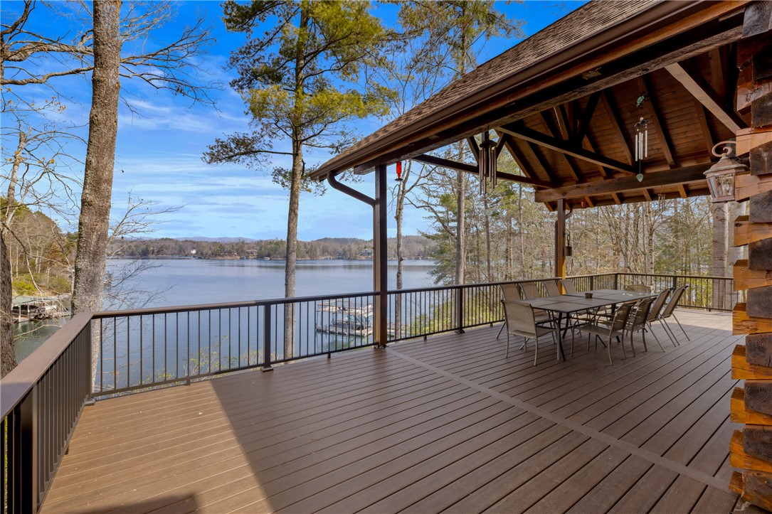 109 Deer Laurel Way Salem, SC 29676 - Photo 43 of 50 Enjoy al fresco dining and sweeping lake views from this expansive covered patio.
