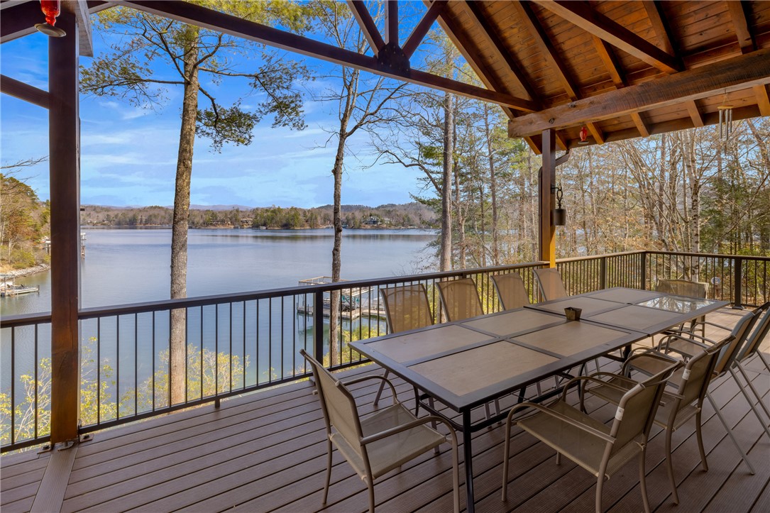 109 Deer Laurel Way Salem, SC 29676 - Photo 44 of 50 This captivating lakefront deck offers tranquil water views and a perfect setting for outdoor enjoyment.