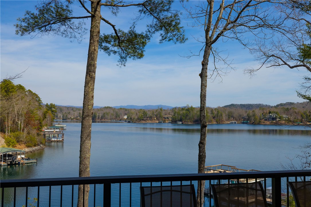 109 Deer Laurel Way Salem, SC 29676 - Photo 45 of 50 Enjoy expansive lake views from this serene outdoor living space, perfect for tranquil moments.