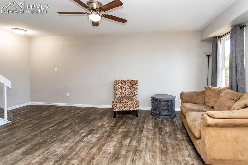 4505 Lamplighter Circle Colorado Springs, CO 80916 - Photo 12 of 39 a living room with a couch and a rug