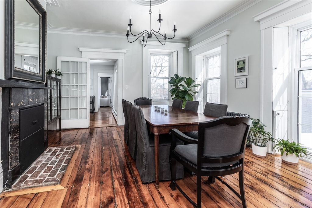 27 St James Street Boston, MA 02119 - Photo 8 of 26 a view of a dining room with furniture and wooden floor