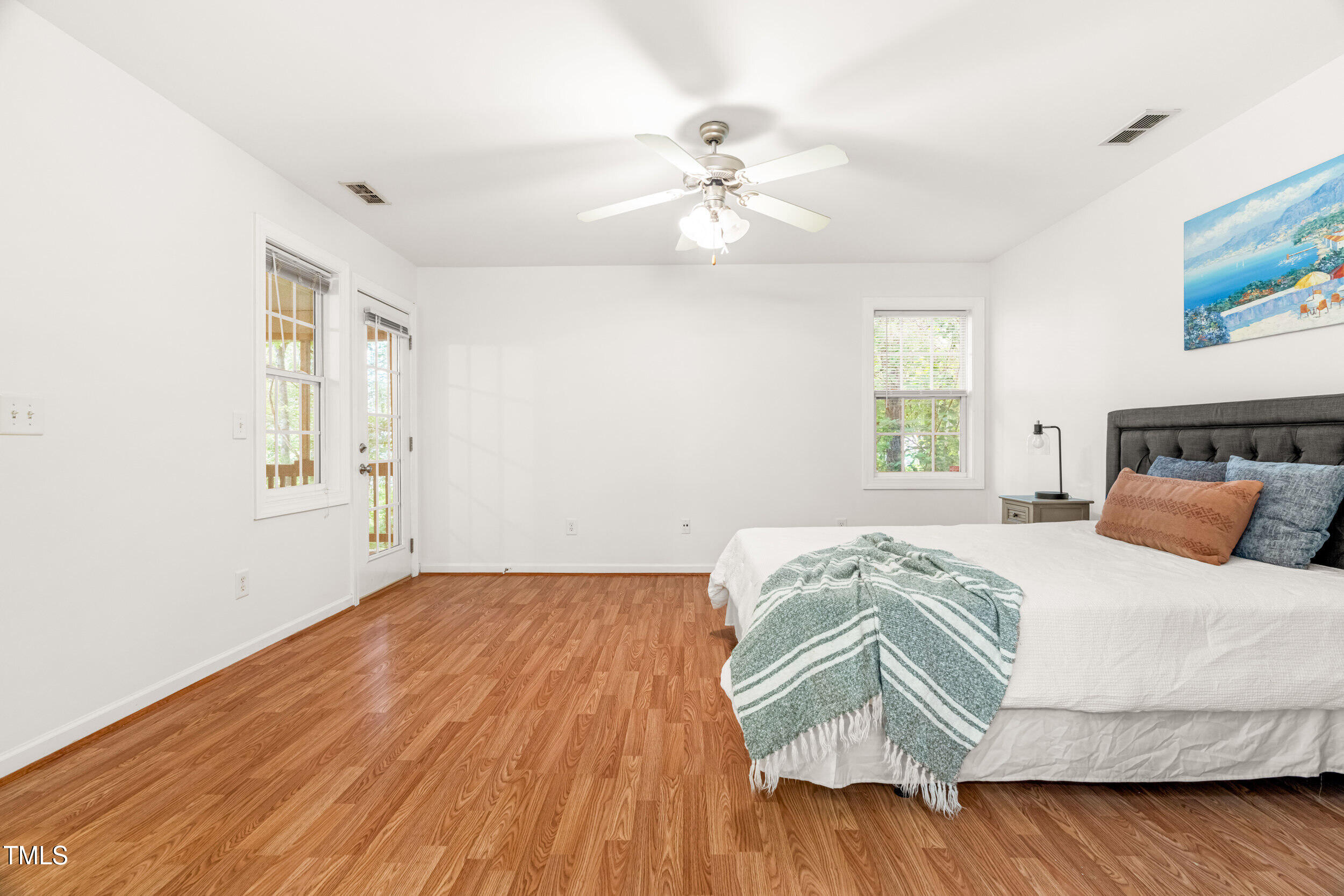 2221 Mountain Mist Court, Unit 201 Raleigh, NC 27603 - Photo 19 of 26 a bedroom with a bed and window