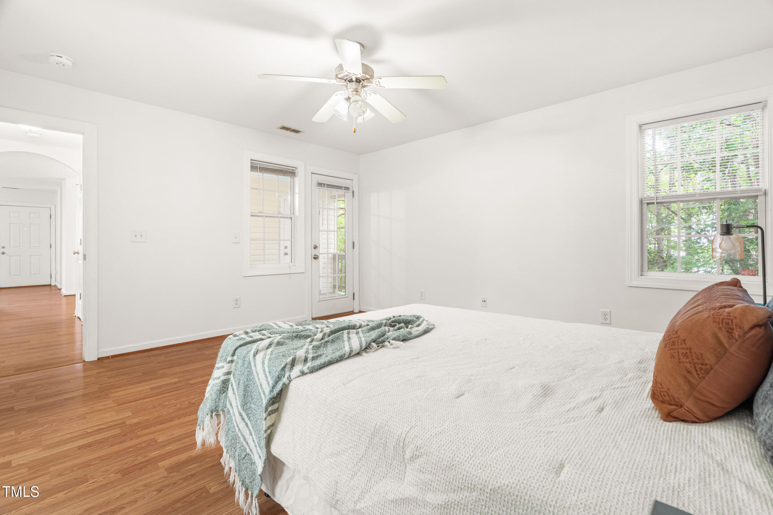 2221 Mountain Mist Court, Unit 201 Raleigh, NC 27603 - Photo 20 of 26 a bedroom with a bed and a window