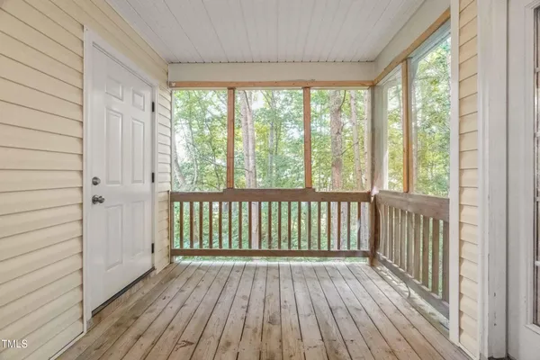 a view of wooden balcony and wooden floor