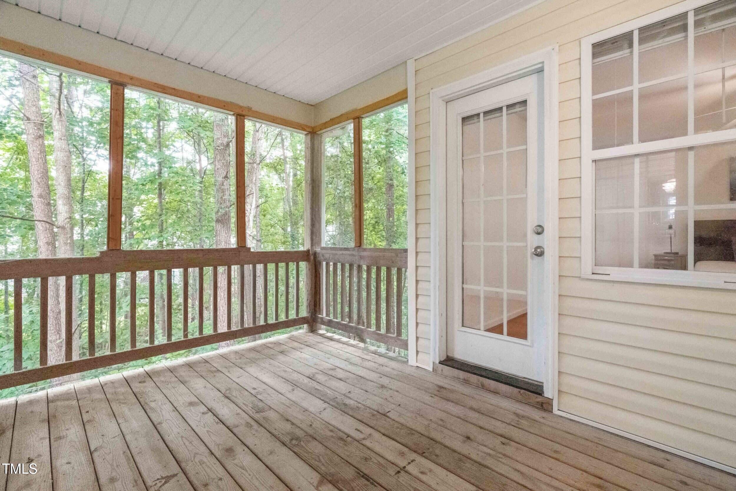 2221 Mountain Mist Court, Unit 201 Raleigh, NC 27603 - Photo 25 of 26 a view of wooden balcony and wooden floor