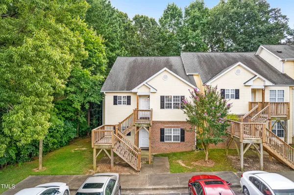 aerial view of a house with a yard