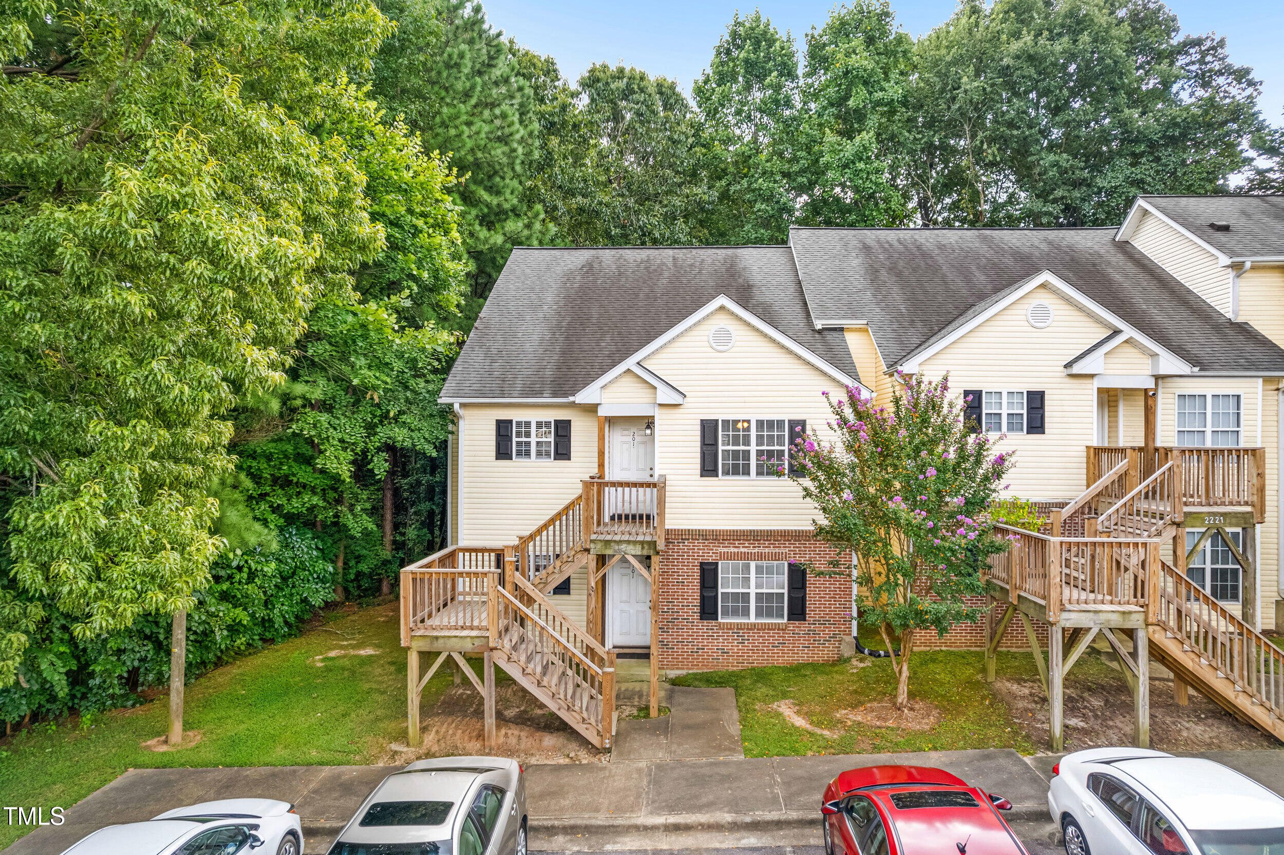 2221 Mountain Mist Court, Unit 201 Raleigh, NC 27603 - Photo 5 of 26 aerial view of a house with a yard