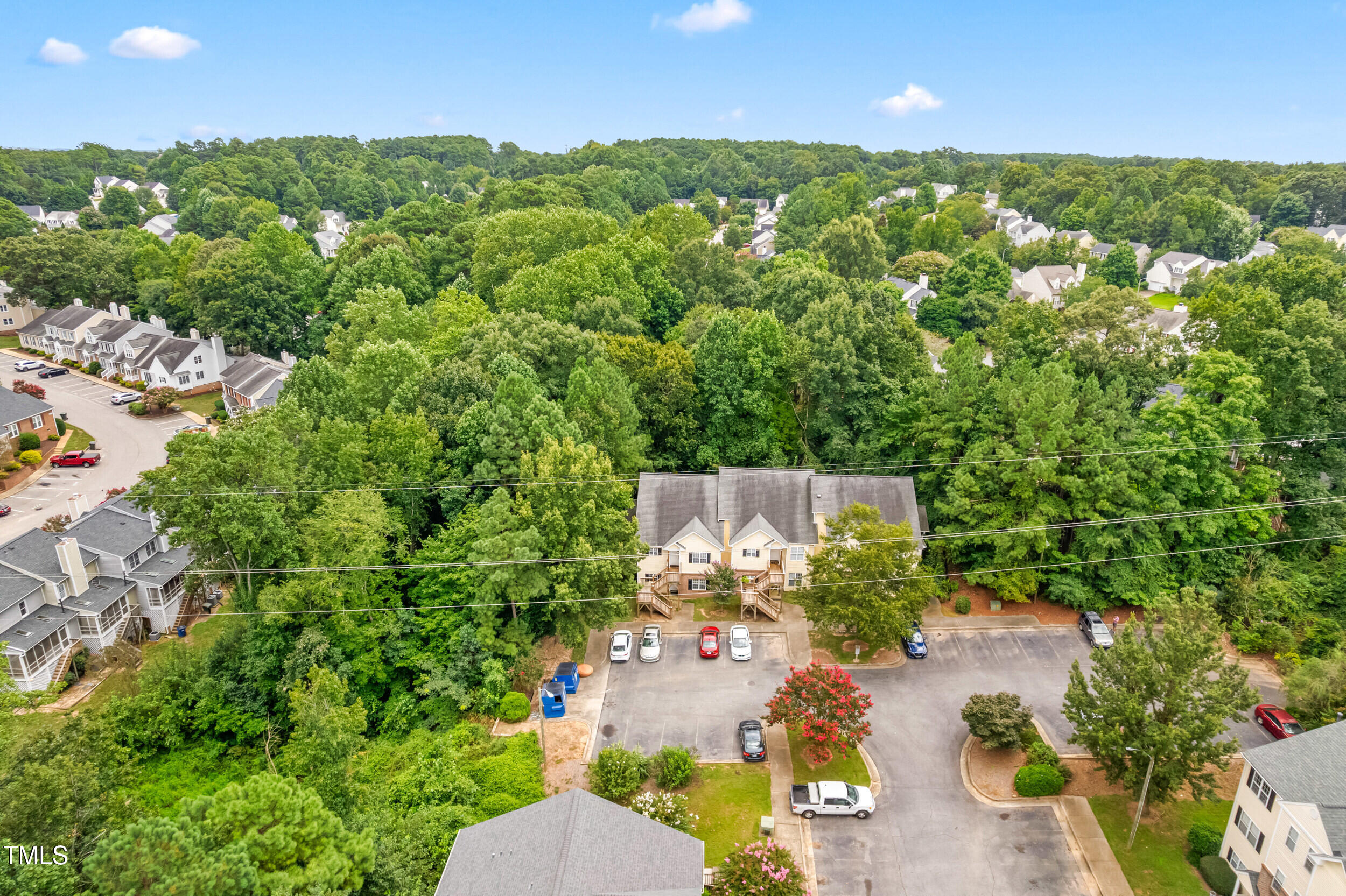 2221 Mountain Mist Court, Unit 201 Raleigh, NC 27603 - Photo 7 of 26 an aerial view of a house with a yard