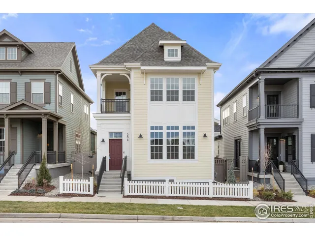 a front view of a house with wooden floor