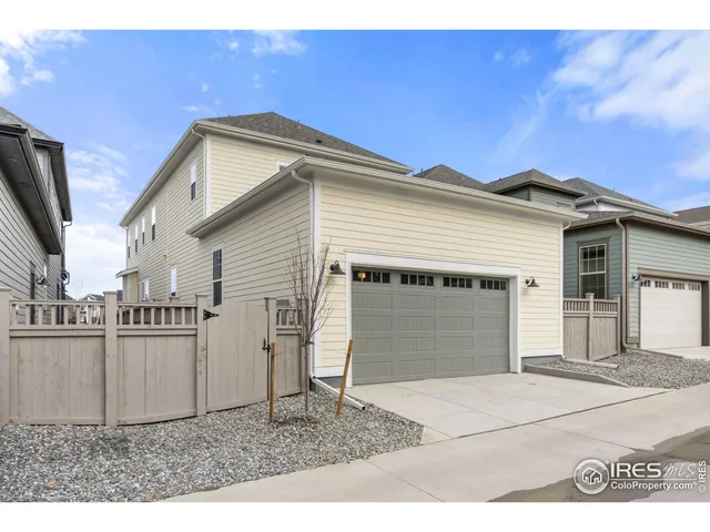 a view of a house with a garage