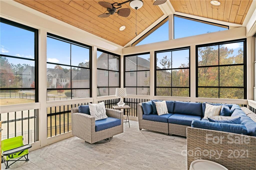 16024 Loch Raven Road Huntersville, NC 28078 - Photo 14 of 45 a living room with furniture and a large window