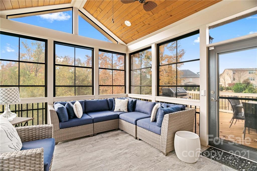 16024 Loch Raven Road Huntersville, NC 28078 - Photo 15 of 45 a living room with furniture and a large window