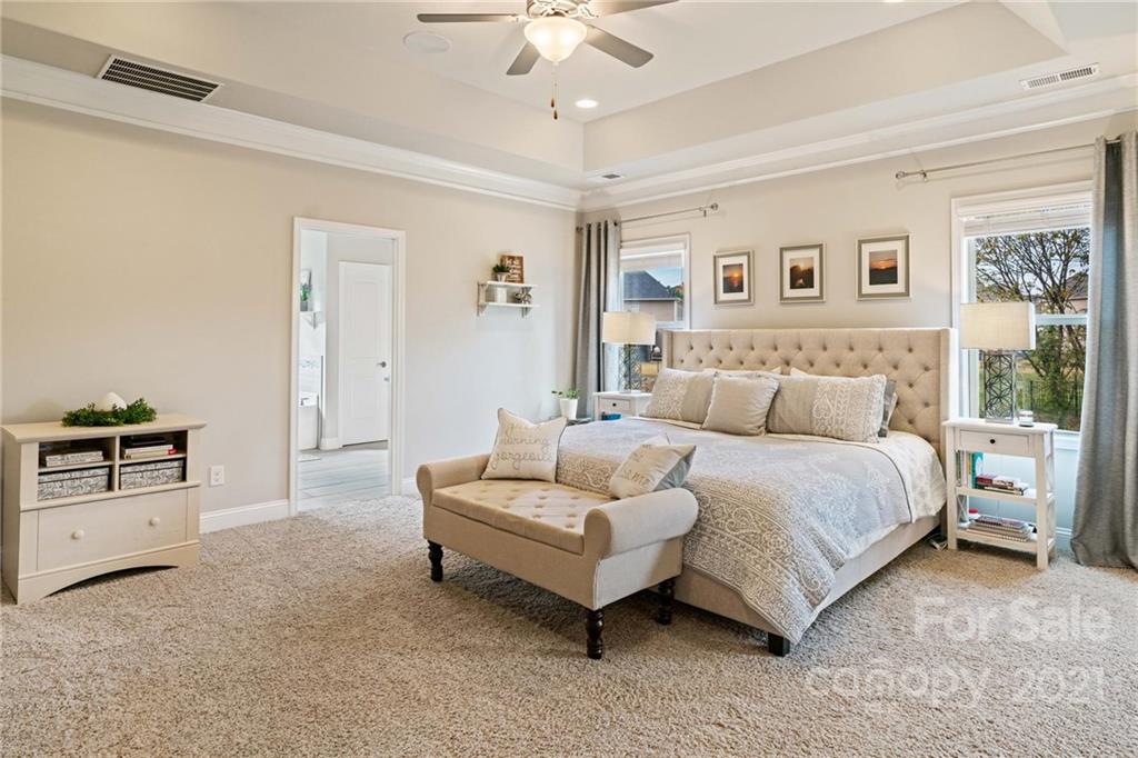 16024 Loch Raven Road Huntersville, NC 28078 - Photo 18 of 45 a spacious bedroom with a bed and a couch