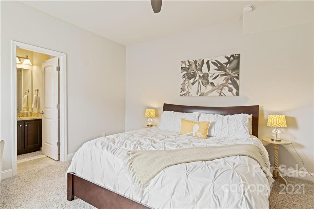 16024 Loch Raven Road Huntersville, NC 28078 - Photo 26 of 45 a bedroom with a bed and painting on the wall