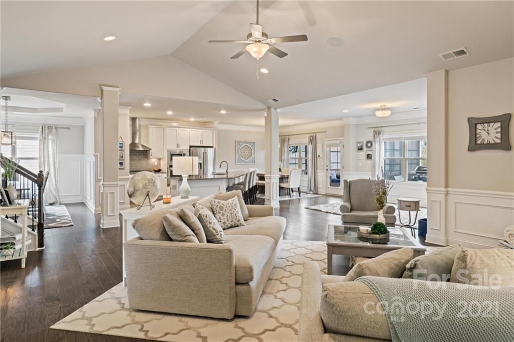 16024 Loch Raven Road Huntersville, NC 28078 - Photo 4 of 45 a living room with furniture kitchen view and a wooden floor