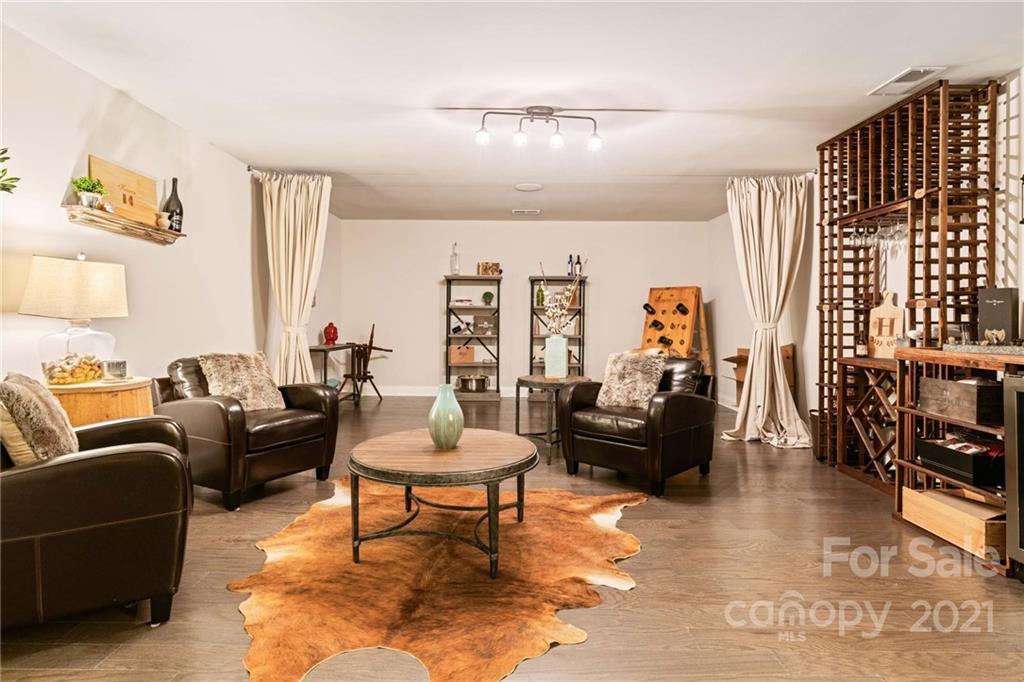 16024 Loch Raven Road Huntersville, NC 28078 - Photo 38 of 45 a living room with furniture and a large window