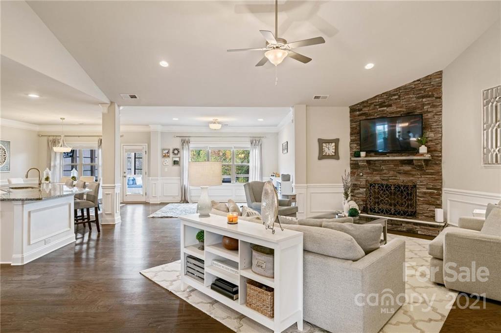 16024 Loch Raven Road Huntersville, NC 28078 - Photo 7 of 45 a living room with fireplace furniture and a flat screen tv