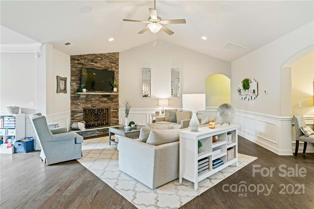 16024 Loch Raven Road Huntersville, NC 28078 - Photo 9 of 45 a living room with fireplace furniture and a rug