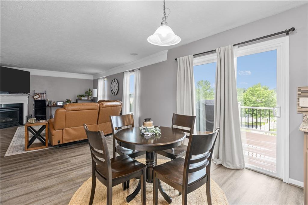 421 Colt Circle Clinton, PA 15026 - Photo 12 of 32 a view of a dining room with furniture window and wooden floor