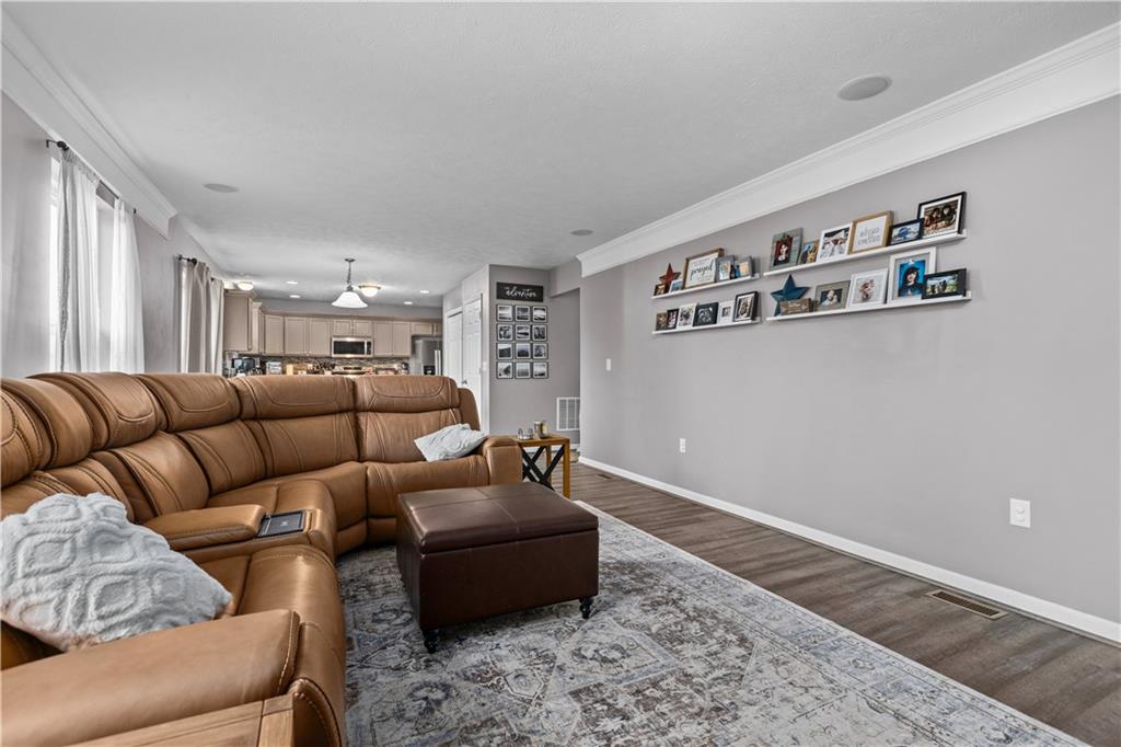 421 Colt Circle Clinton, PA 15026 - Photo 15 of 32 a living room with furniture and rug