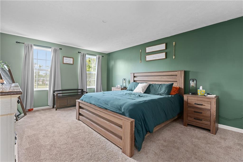 421 Colt Circle Clinton, PA 15026 - Photo 17 of 32 a bedroom with a bed and a dresser