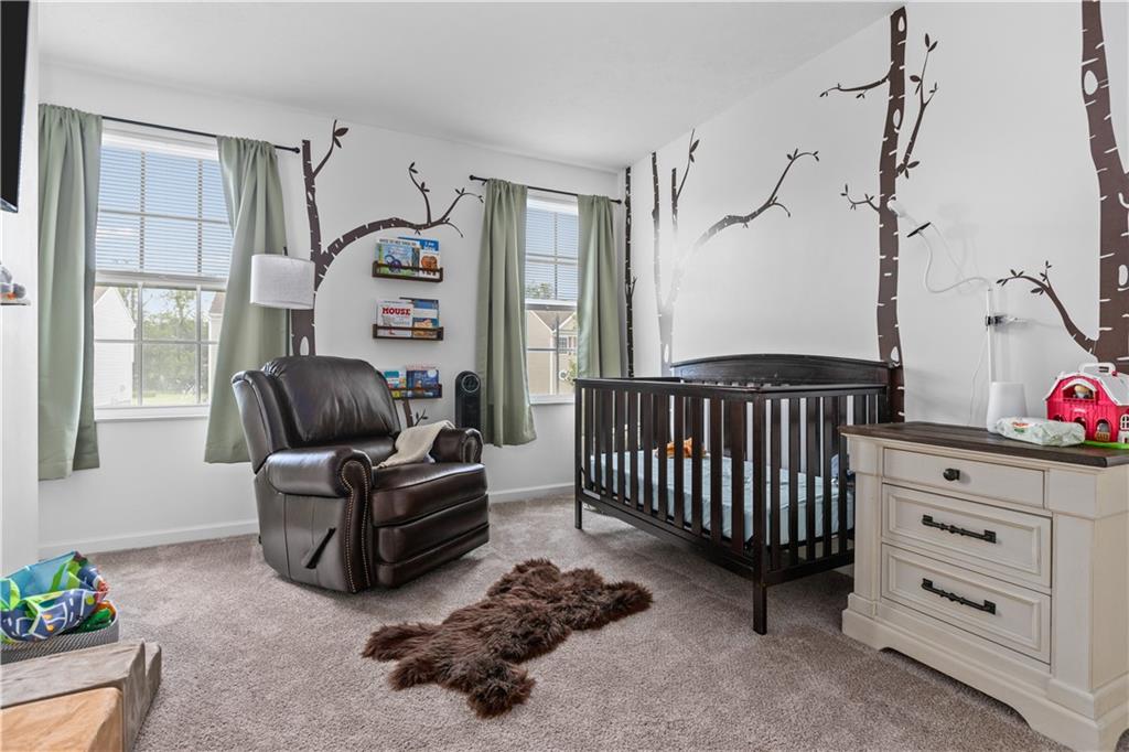 421 Colt Circle Clinton, PA 15026 - Photo 27 of 32 a bedroom with furniture and a window