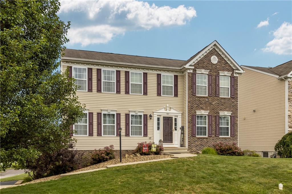 421 Colt Circle Clinton, PA 15026 - Photo 3 of 32 a front view of a house with garden