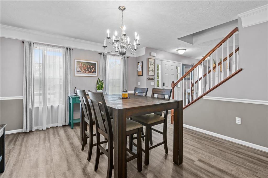 421 Colt Circle Clinton, PA 15026 - Photo 7 of 32 a view of a dining room with furniture and window