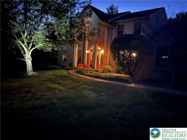 a view of a lobby with chair and table and chairs