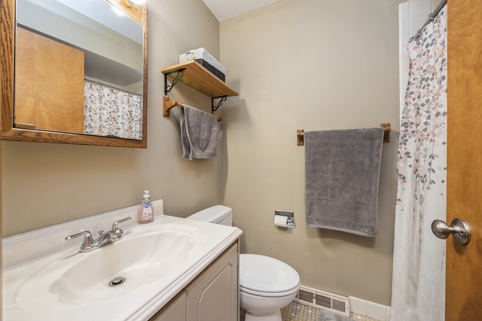 4425 Forest Avenue Brookfield, IL 60513 - Photo 11 of 12 a bathroom with a sink toilet and shower