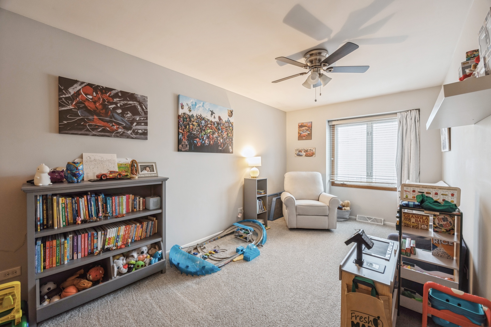 4425 Forest Avenue Brookfield, IL 60513 - Photo 9 of 12 a bedroom with furniture and a book shelf