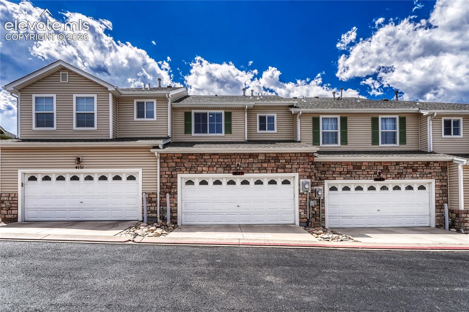 4147 Diamond Ridge View Colorado Springs, CO 80918 - Photo 31 of 42 Tucked away in a quiet alley, your private double garage is easy to access and keeps the front of your home looking clean and uncluttered
