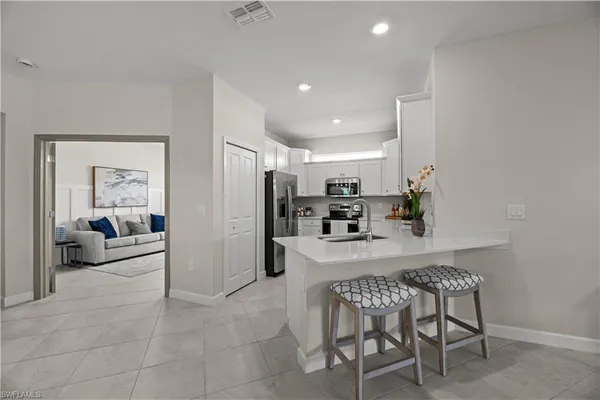 $294,950 | 9051 Leatherwood Loop, Lehigh Acres, FL 33936