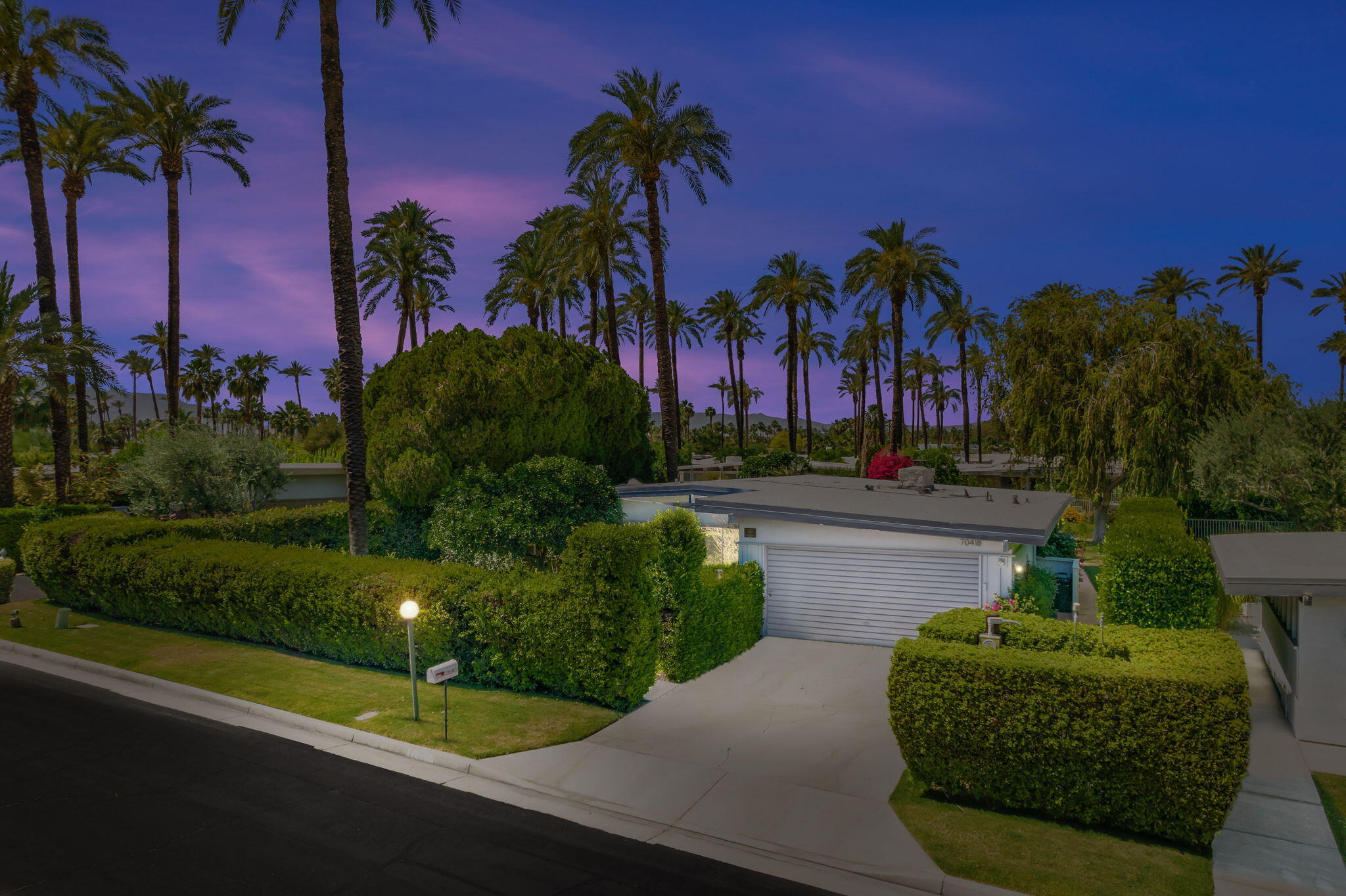 70418 Tamarisk Lane Rancho Mirage, CA 92270 - Photo 1 of 41 a view of a yard and palm trees