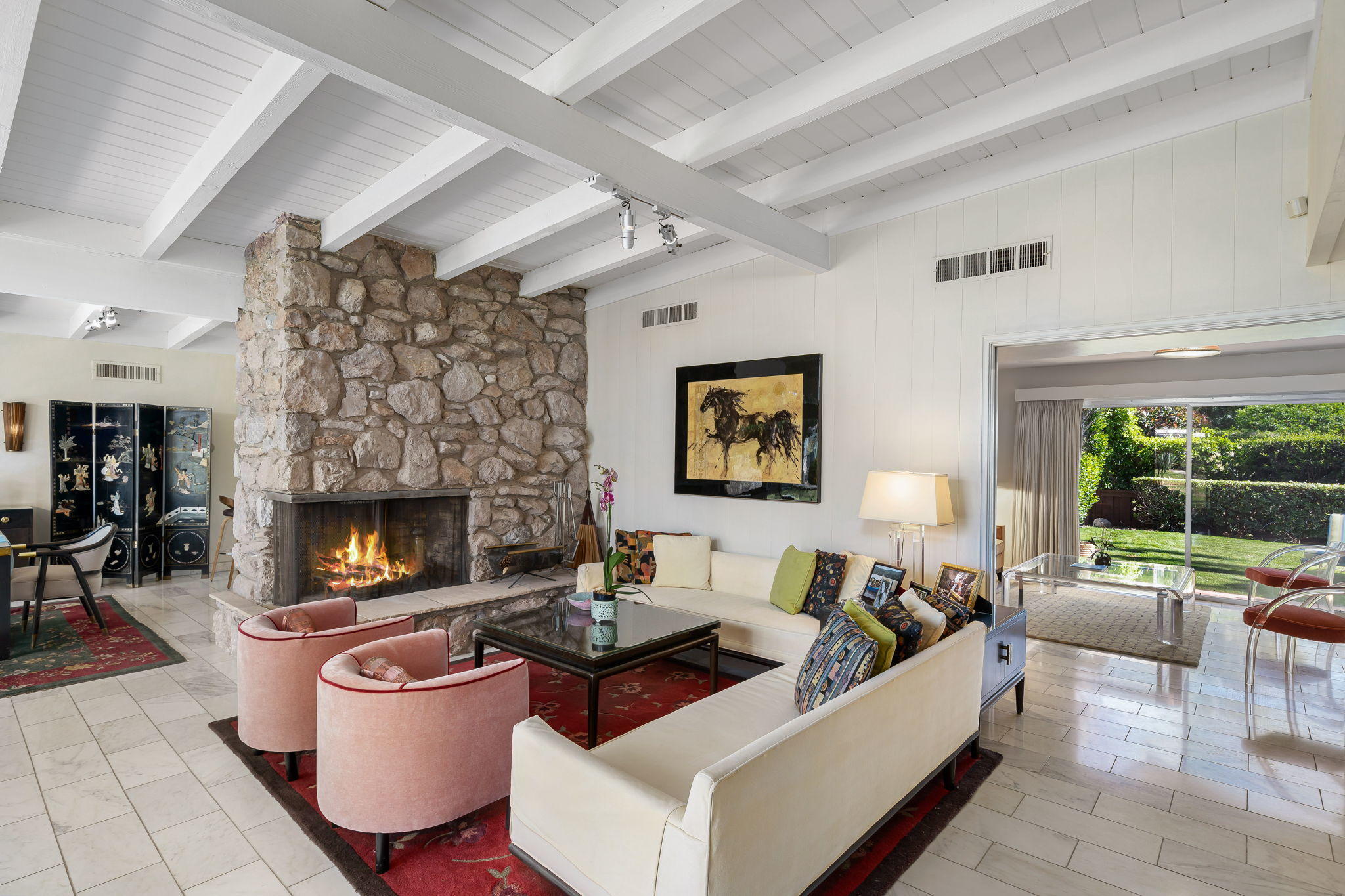 70418 Tamarisk Lane Rancho Mirage, CA 92270 - Photo 23 of 41 a living room with furniture and a fireplace