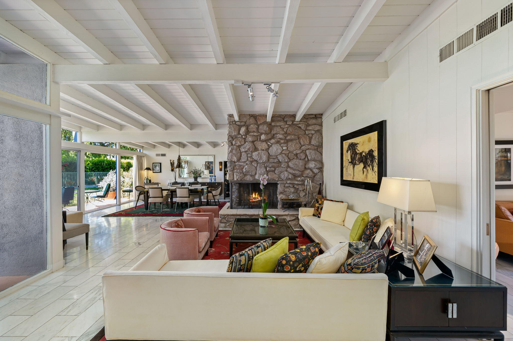 70418 Tamarisk Lane Rancho Mirage, CA 92270 - Photo 24 of 41 a living room with furniture and a fireplace