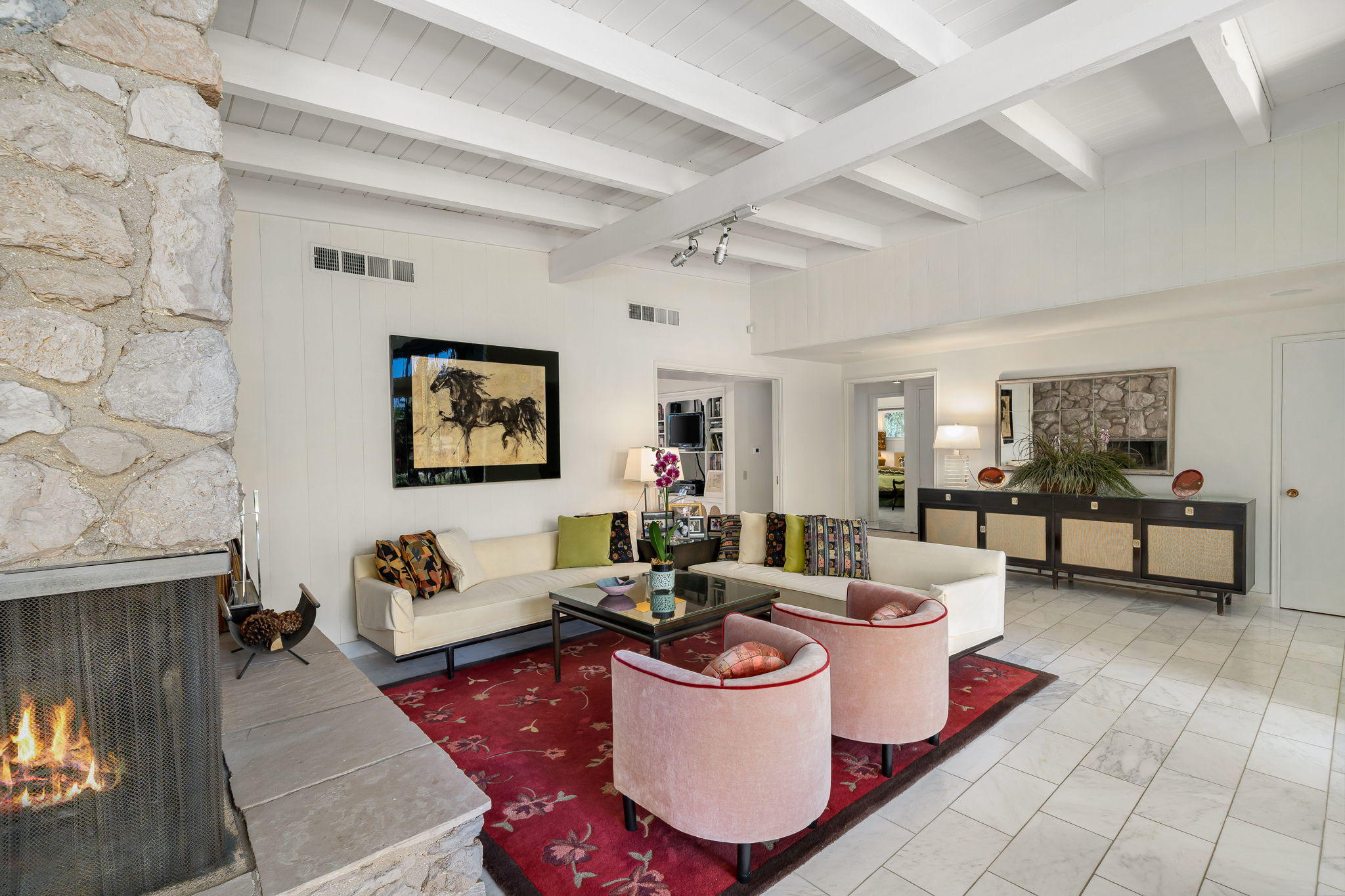 70418 Tamarisk Lane Rancho Mirage, CA 92270 - Photo 26 of 41 a living room with furniture and a fireplace